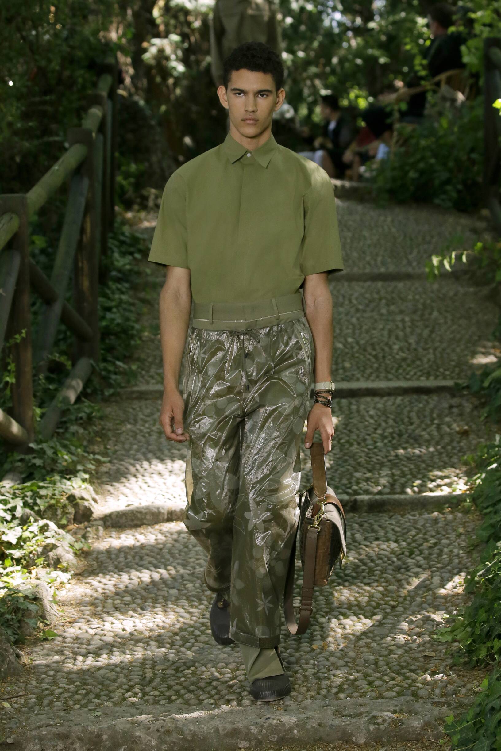 Man with White Nike Foam Shoes and Trousers with Butterflies Design before  Fendi Fashion Show, Milan Fashion Editorial Stock Image - Image of  trousers, shoes: 194561924